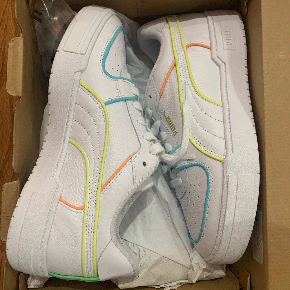 White highlighter Puma sneakers